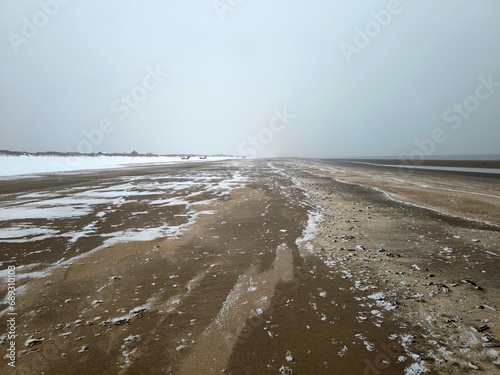 Schneetreiben am Strand von Blavandshuk photo