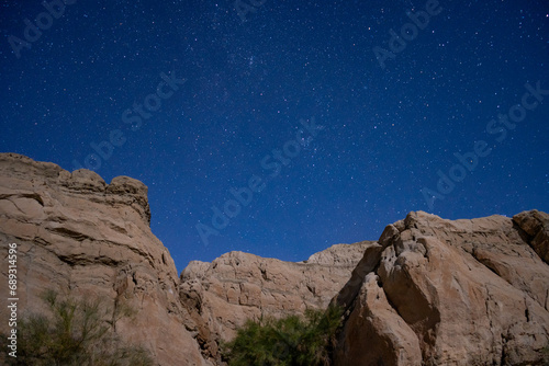 Starry sky photographs taken from inside a canyon in the Mojave Desert of Southern California. photo