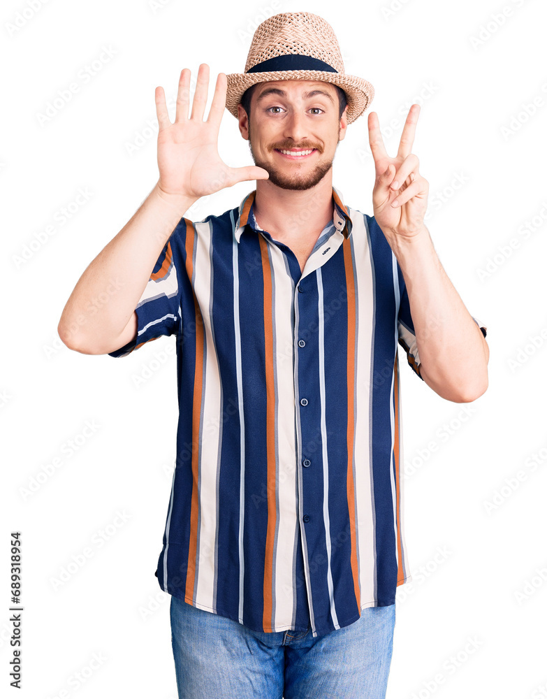 Young handsome caucasian man wearing summer hat showing and pointing up with fingers number seven while smiling confident and happy. Young handsome caucasian man wearing summer hat showing and pointing up with fingers number seven while smiling confident and happy.
