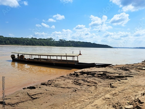 wooden boat on the river
