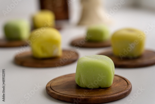 Warabimochi is a jelly-like confection made from fern starch and coated or dipped in kinako