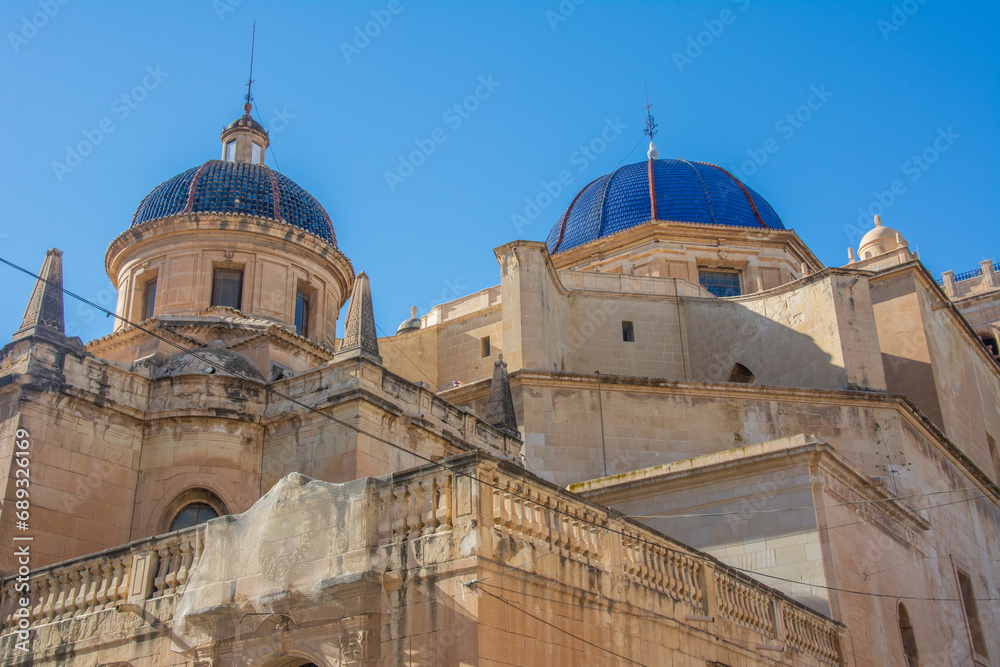 View of blue domes of the Spanish Baroque style Basilica of Santa Maria de Elche built in 1672 in Elche, Alicante, Spain