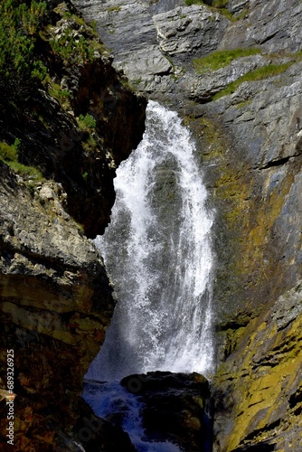 waterfall. water sleeping in the mountains. Mountains, alps and water