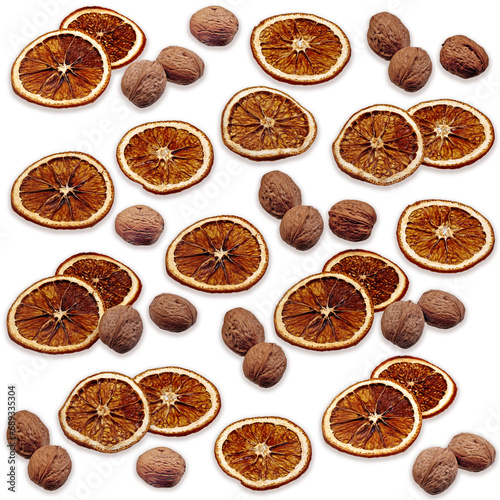 Background of walnuts and dried citrus slices. Backdrop for design