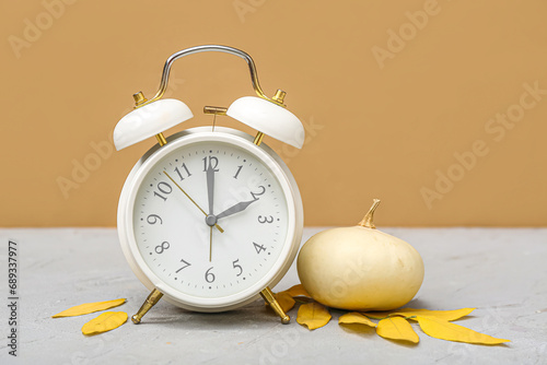 Alarm clock with autumn lea...