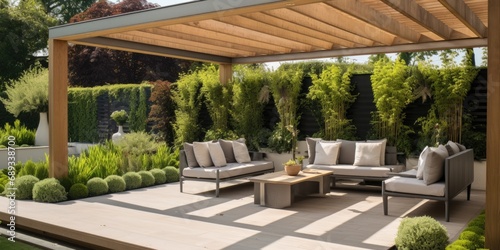 Fototapete Green garden outdoor patio with wooden pergola and comfortable seating