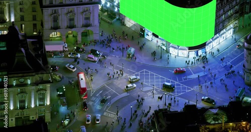 Establishment Aerial Overhead Shot of Piccadilly Circus in United Kingdom. Video Displays With Chroma Key.  Regent Street and Shaftesbury Ave, Full of People Traffic Cars And Double-Decker Buses