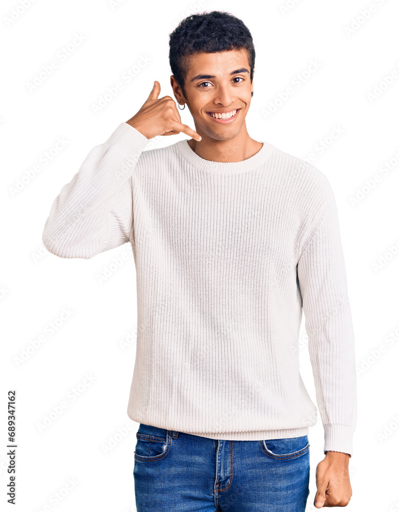 Young african amercian man wearing casual clothes smiling doing phone gesture with hand and fingers like talking on the telephone. communicating concepts. Young african amercian man wearing casual clothes smiling doing phone gesture with hand and fingers like talking on the telephone. communicating concepts.