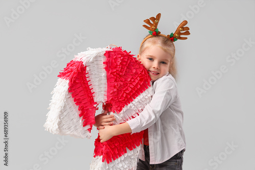 Cute little girl in reindee...