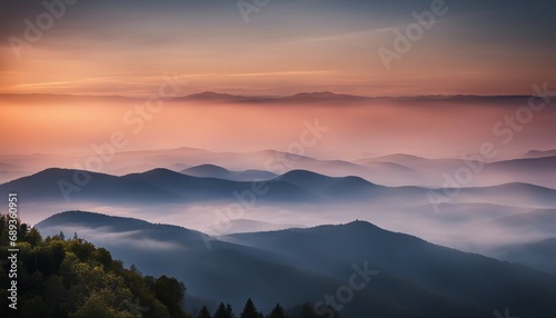 sunrise view over the foggy mountains 