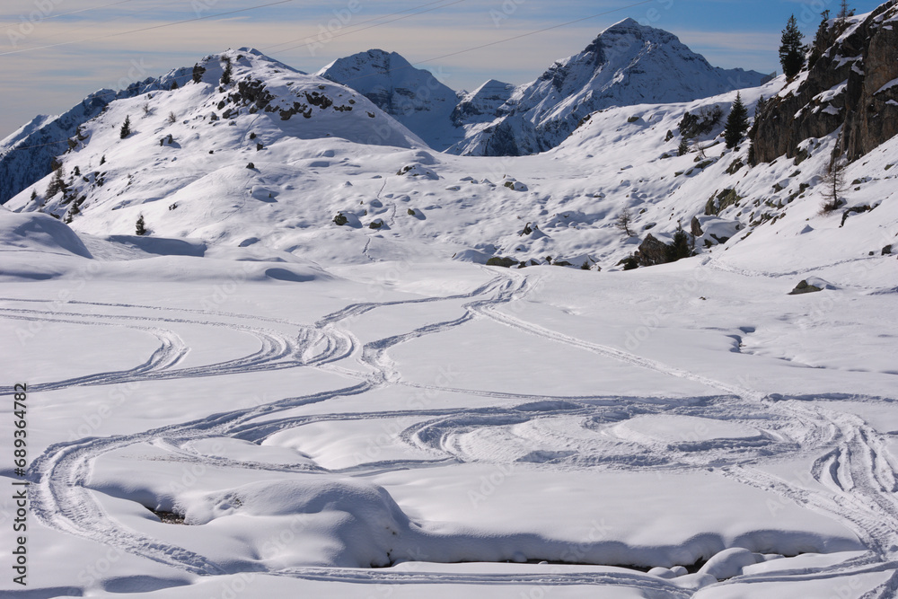 Tracks in te fresh snow. Dordona pass (Italian: Passo di Dordona). Foppolo, Lombardy, Italy Tracks in te fresh snow. Dordona pass (Italian: Passo di Dordona). Foppolo, Lombardy, Italy