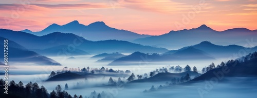 sunrise over the foggy mountains 
