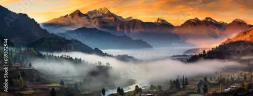 sunrise over the foggy mountains,