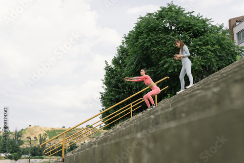 Active Friends Exercising Outdoors in Urban Environment