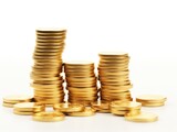 Stacks of gold coins on a white background. Financial sphere, money. Profit for the year. Banking. Trading exchanges, investments, trading. Rising prices, economy, currencies. Precious metals.