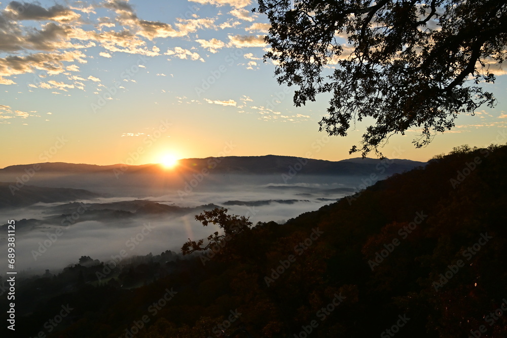 sunset over the fog