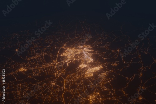 Aerial shot on Meknes (Morocco) at night, view from east. Imitation of satellite view on modern city with street lights and glow effect. 3d render