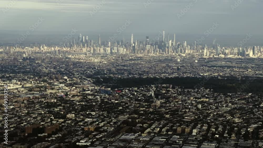 Manhattan Skyline from Plane Window over Queens and Brooklyn Manhattan Skyline from Plane Window over Queens and Brooklyn