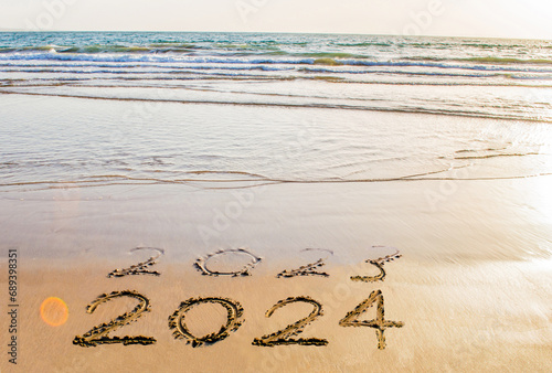 happy new year 2024 on sea beach