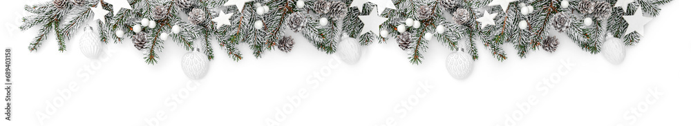 Merry Christmas garland made of snowy fir branches, white decoration, sparkles and confetti on white background. Happy New Year and Xmas, top view, wide banner