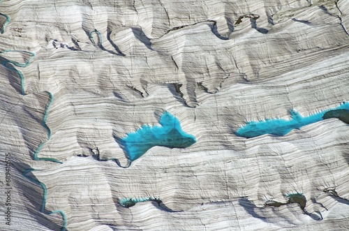 Meltwater lake nwith blue water on glacier, flight photo, national park, adventure, travel, Kennicott, Wrangell St. Elias National Park, Alaska, USA, North America photo