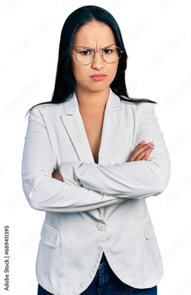 Beautiful hispanic woman with nose piercing wearing business jacket and glasses skeptic and nervous, disapproving expression on face with crossed arms. negative person. Beautiful hispanic woman with nose piercing wearing business jacket and glasses skeptic and nervous, disapproving expression on face with crossed arms. negative person.