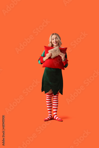 Smiling young woman dressed...