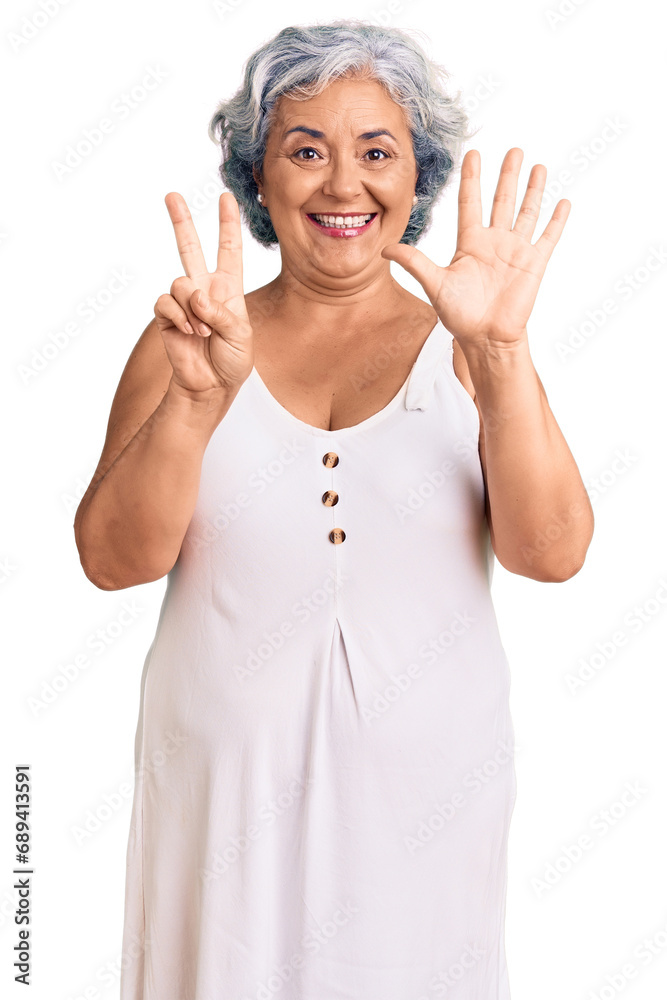 Senior woman with gray hair wearing casual clothes showing and pointing up with fingers number seven while smiling confident and happy. Senior woman with gray hair wearing casual clothes showing and pointing up with fingers number seven while smiling confident and happy.