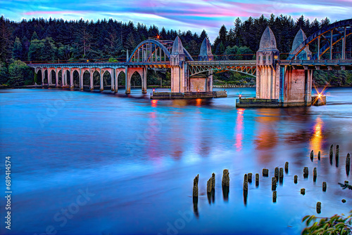 Florence Oregon Bridge Highway 101 Oregon Coast Tourist Destination Sunset Reflections on Water 1 photo