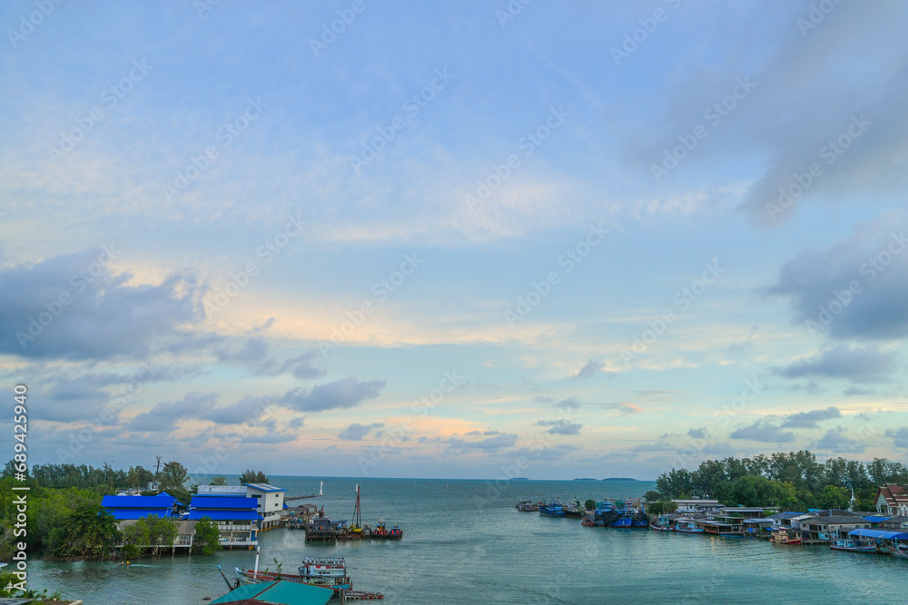 the panorama view landscape of Sea Gulf with a pier of boats. The village of sailors and fishing boats in Thailand.