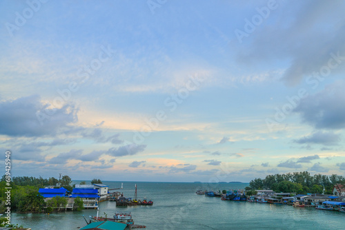 the panorama view landscape of Sea Gulf with a pier of boats. The village of sailors and fishing boats in Thailand. © ultramansk