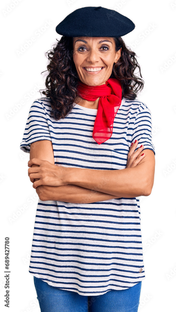 Middle age beautiful woman wearing french beret and scarf happy face smiling with crossed arms looking at the camera. positive person. Middle age beautiful woman wearing french beret and scarf happy face smiling with crossed arms looking at the camera. positive person.