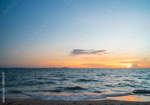 Panorama viewpoint landscape travel summer sea wind wave cool on holiday calm coastal big sun set sky light orange golden Nature tropical Beautiful evening hourday At Bang san Beach Chonburi Thailand.