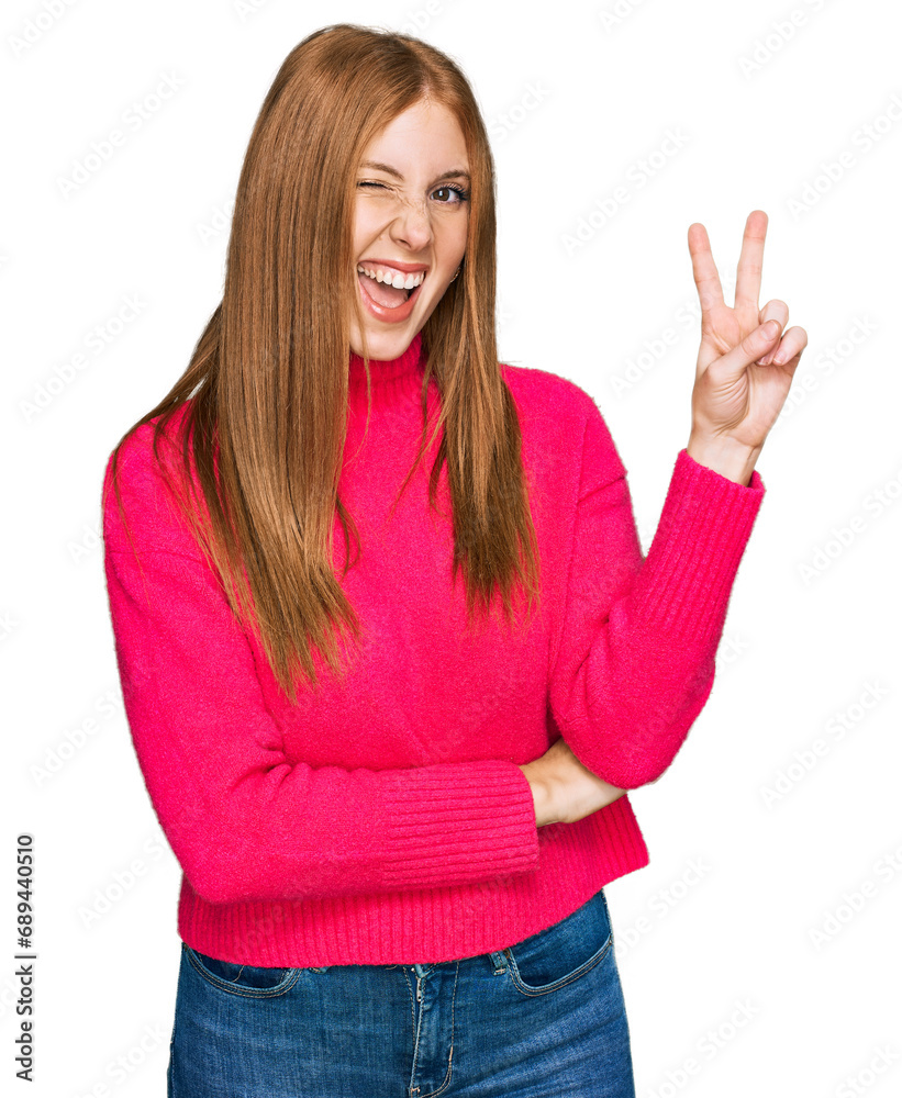 Young irish woman wearing casual clothes smiling with happy face winking at the camera doing victory sign. number two. Young irish woman wearing casual clothes smiling with happy face winking at the camera doing victory sign. number two.