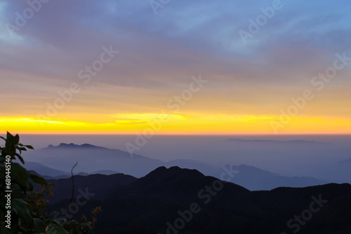 The sunrise sky and the morning mist at the Adam s Peak  Sri Lanka