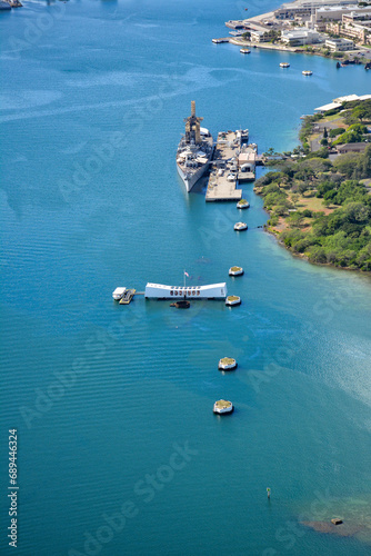 Aerial view of the USS Arizona war memorial with the USS Missouri battleship at Pearl Harbor in Honolulu on Oahu, Hawaii