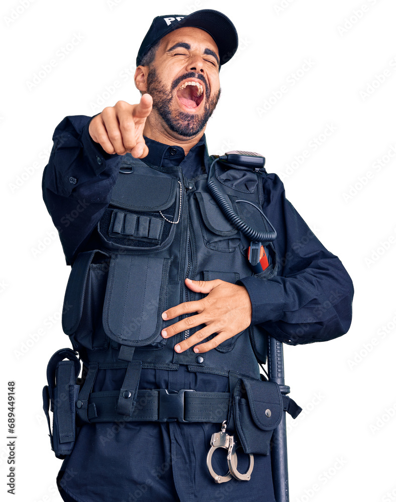 Young hispanic man wearing police uniform laughing at you, pointing finger to the camera with hand over body, shame expression Young hispanic man wearing police uniform laughing at you, pointing finger to the camera with hand over body, shame expression