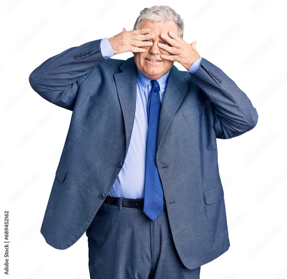 Senior grey-haired man wearing business jacket covering eyes with hands smiling cheerful and funny. blind concept. Senior grey-haired man wearing business jacket covering eyes with hands smiling cheerful and funny. blind concept.