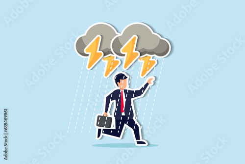 Business problem, obstacle or risk to overcome and succeed, insurance or catastrophe and disaster business day concept, depressed businessman walking with cloudy thunderstorm and rainy around his face