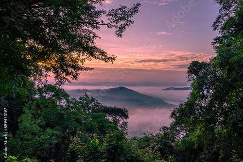 high angle nature background On the mountain overlooking the surrounding natural scenery, overlooking the sea, trees, rocks, trees, adventure tourism.