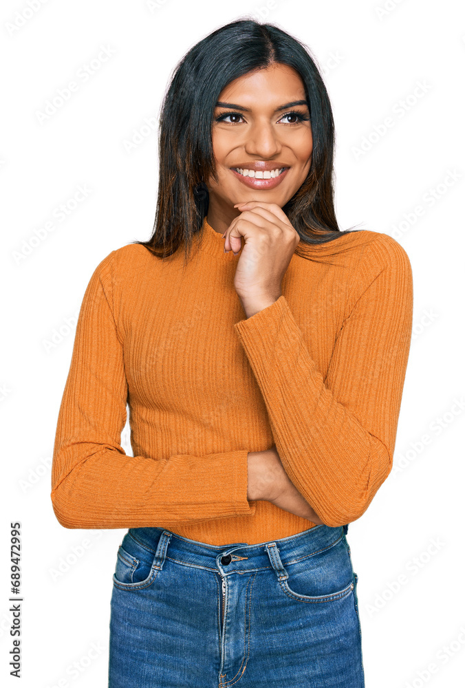 Young latin transsexual transgender woman wearing casual clothes with hand on chin thinking about question, pensive expression. smiling with thoughtful face. doubt concept. Young latin transsexual transgender woman wearing casual clothes with hand on chin thinking about question, pensive expression. smiling with thoughtful face. doubt concept.