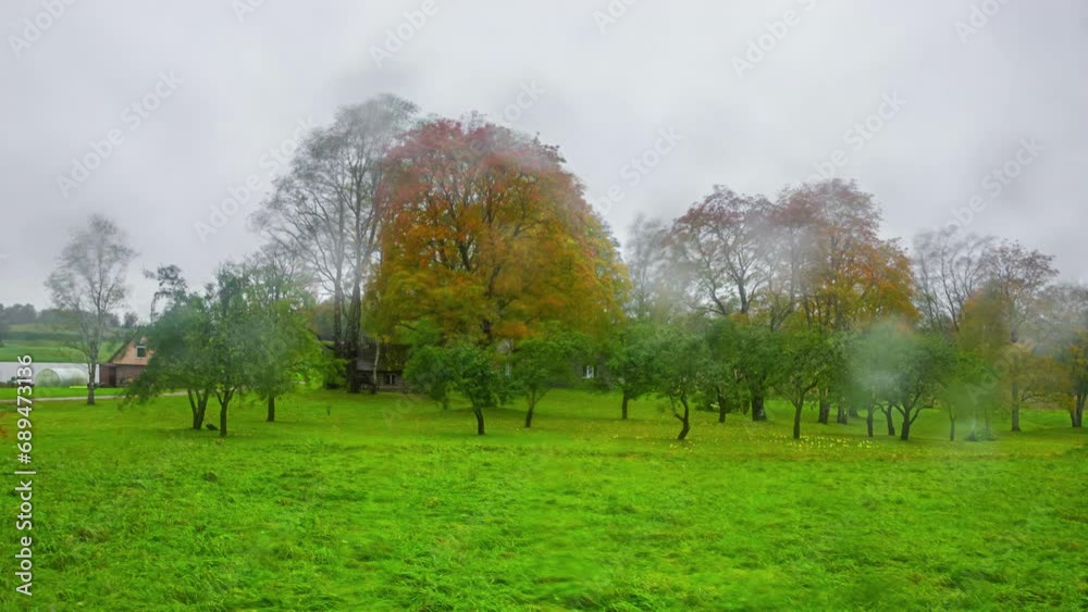 Sky and seasons from autumn to winter at a countryside farmhouse - time lapse