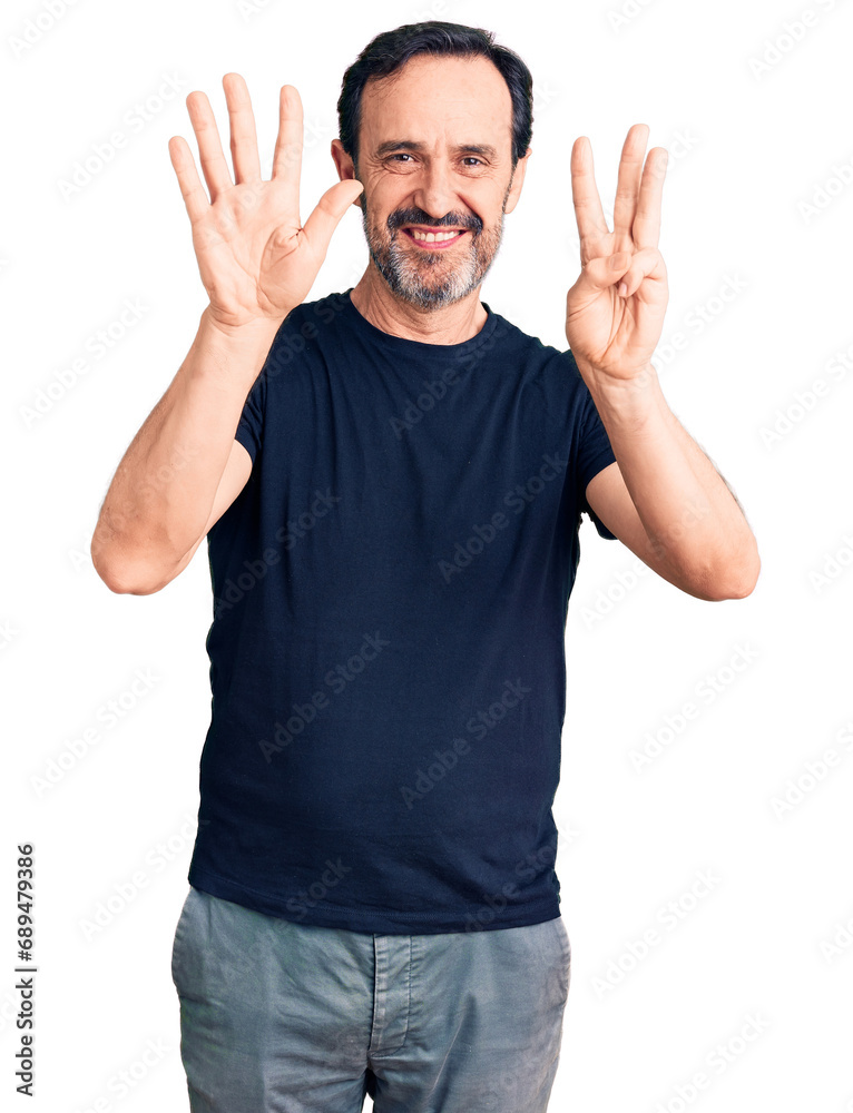 Middle age handsome man wearing casual t-shirt showing and pointing up with fingers number eight while smiling confident and happy. Middle age handsome man wearing casual t-shirt showing and pointing up with fingers number eight while smiling confident and happy.