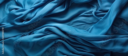 Crumpled, folded blue fleece backdrop. photo