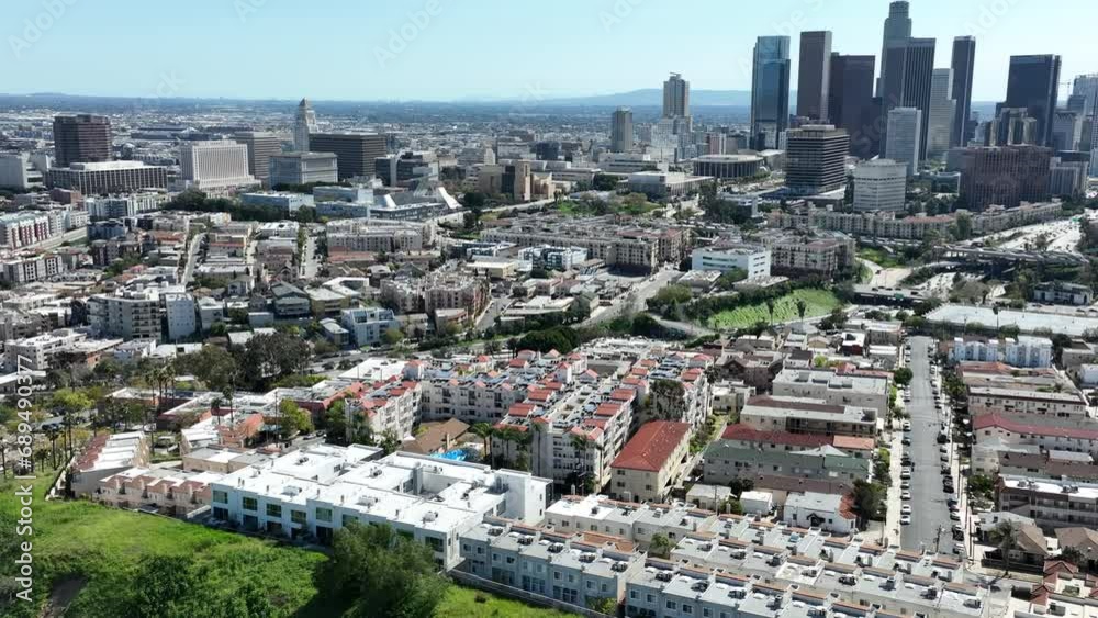 Los Angeles Downtown North from Victor Heights Hills Aerial Shot Back Tilt Up in California USA Los Angeles Downtown North from Victor Heights Hills Aerial Shot Back Tilt Up in California USA