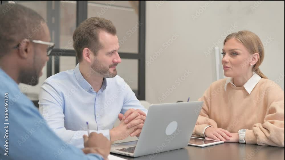 Happy Mixed Race Business People Talking in Office Happy Mixed Race Business People Talking in Office