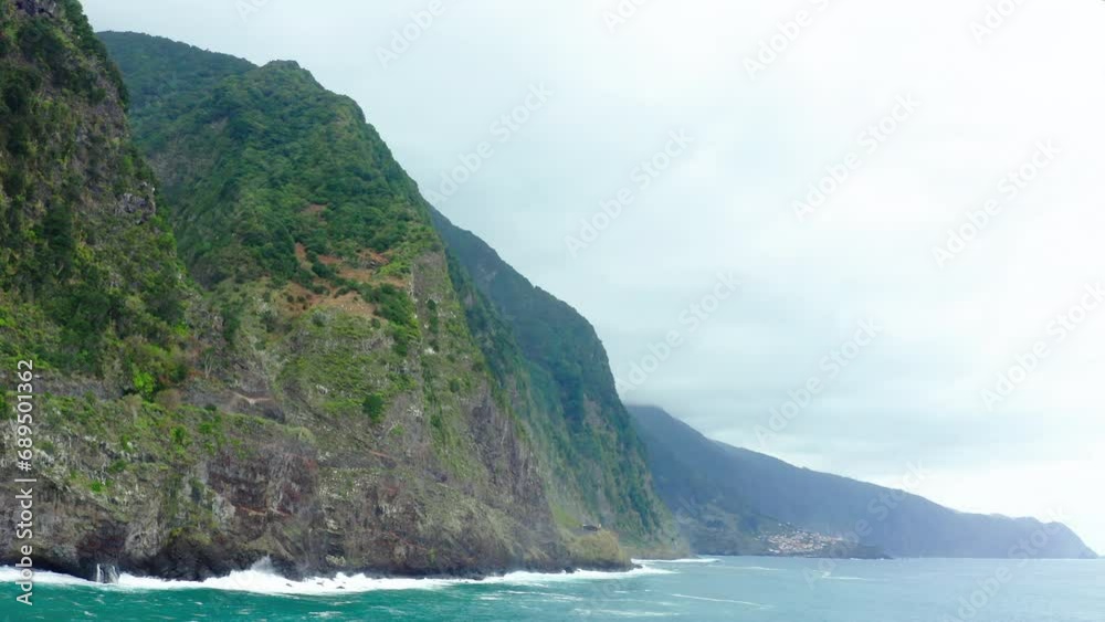 Coastline with waves mountains in clouds Panoramic Ocean Horizon with cliffs panoramic sky drone shot madeira Coastline with waves mountains in clouds Panoramic Ocean Horizon with cliffs panoramic sky drone shot madeira