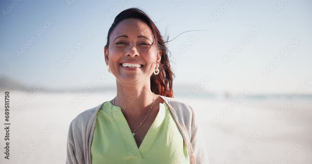 Summer, holiday and face of happy woman on beach, vacation and freedom to relax in nature. Mature, person and portrait with smile from health and wellness in Brazil sunshine, outdoor and blue sky Summer, holiday and face of happy woman on beach, vacation and freedom to relax in nature. Mature, person and portrait with smile from health and wellness in Brazil sunshine, outdoor and blue sky