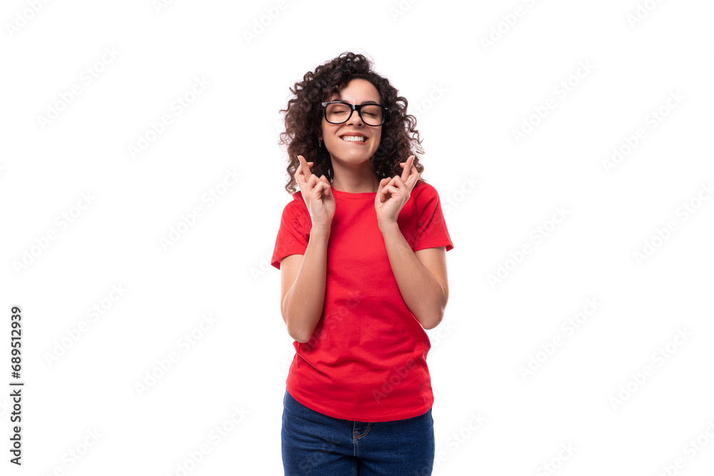 young caucasian active leader woman with black curly hair dressed in red t-shirt with fabric print mockup young caucasian active leader woman with black curly hair dressed in red t-shirt with fabric print mockup