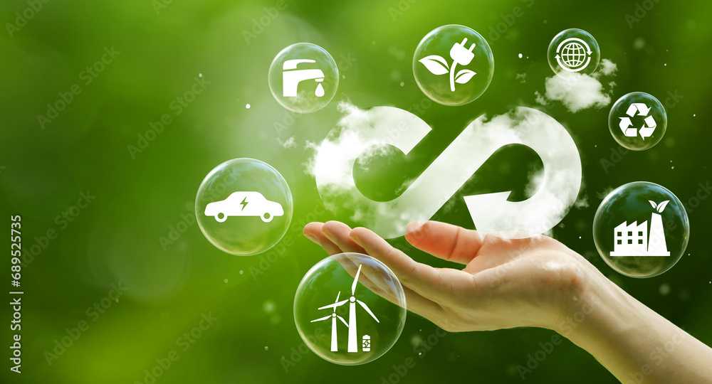 businessman holding circular economy icon Circular economy concept for future business growth and environmental sustainability and reduce pollution for future business and environmental growth. - obrazy, fototapety, plakaty 